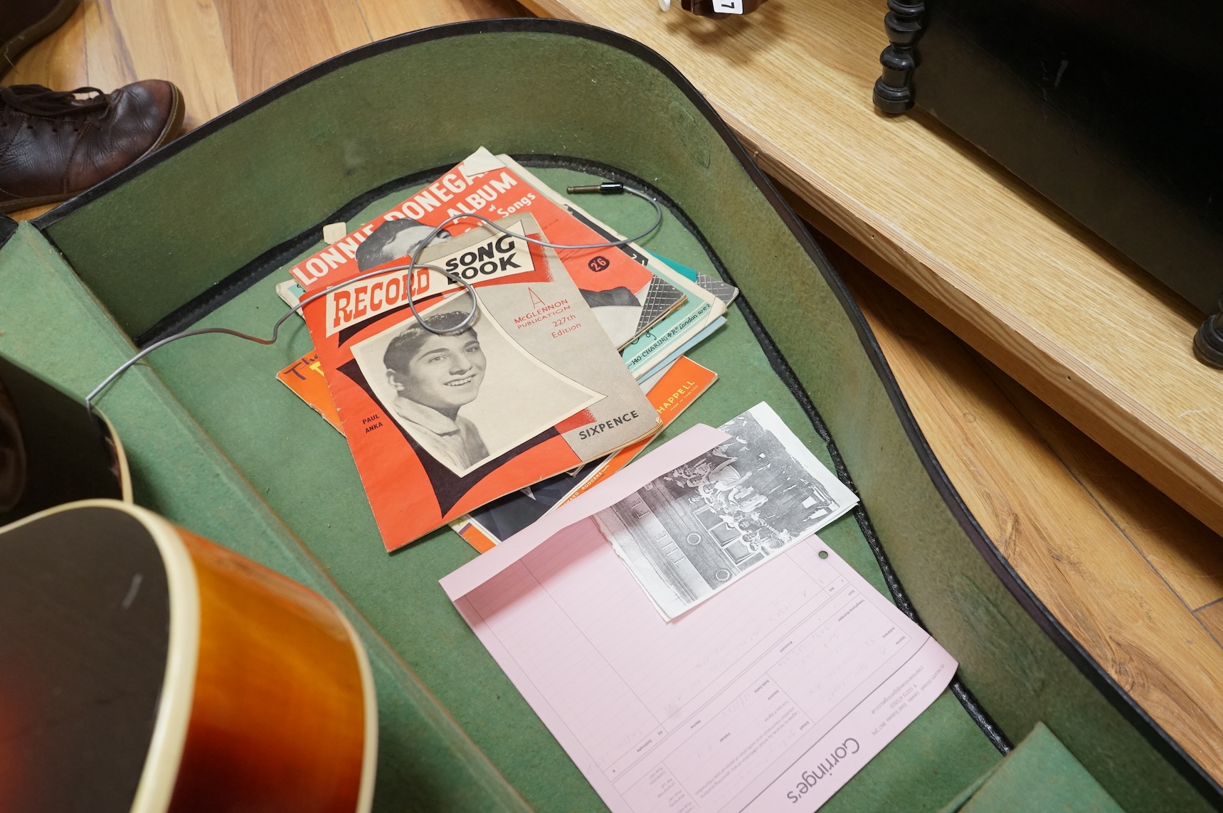 A 1950's Hofner style cut-away acoustic guitar, fitted with a pick up bearing Hofner engraved signature, with hard case.